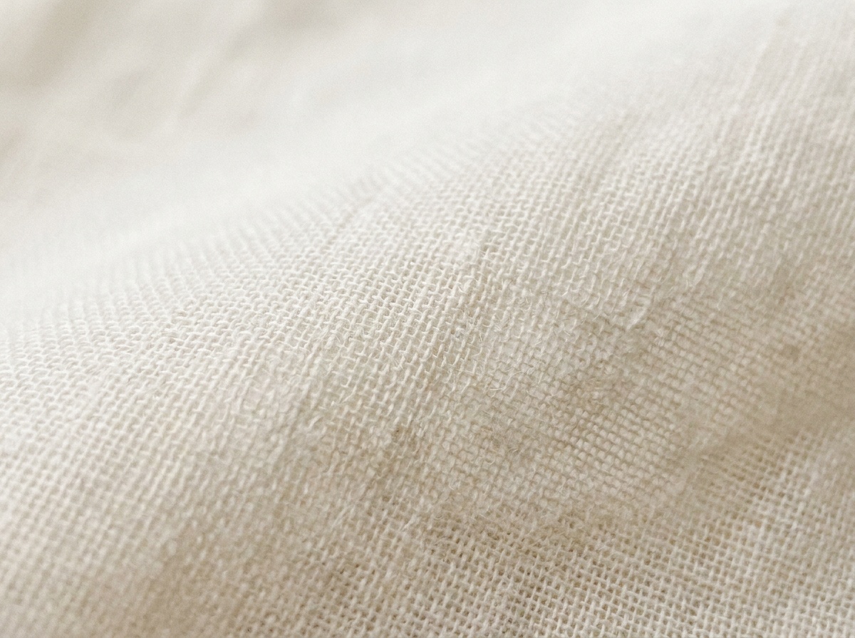 Macro close-up of Cotton Voile, plain weave, fine high-twist yarns