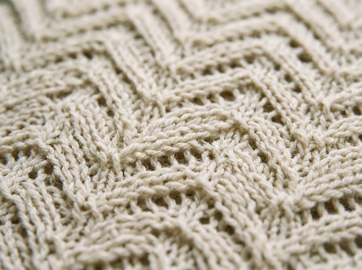 A worked swatch of Chevron Lace, knit texture visible